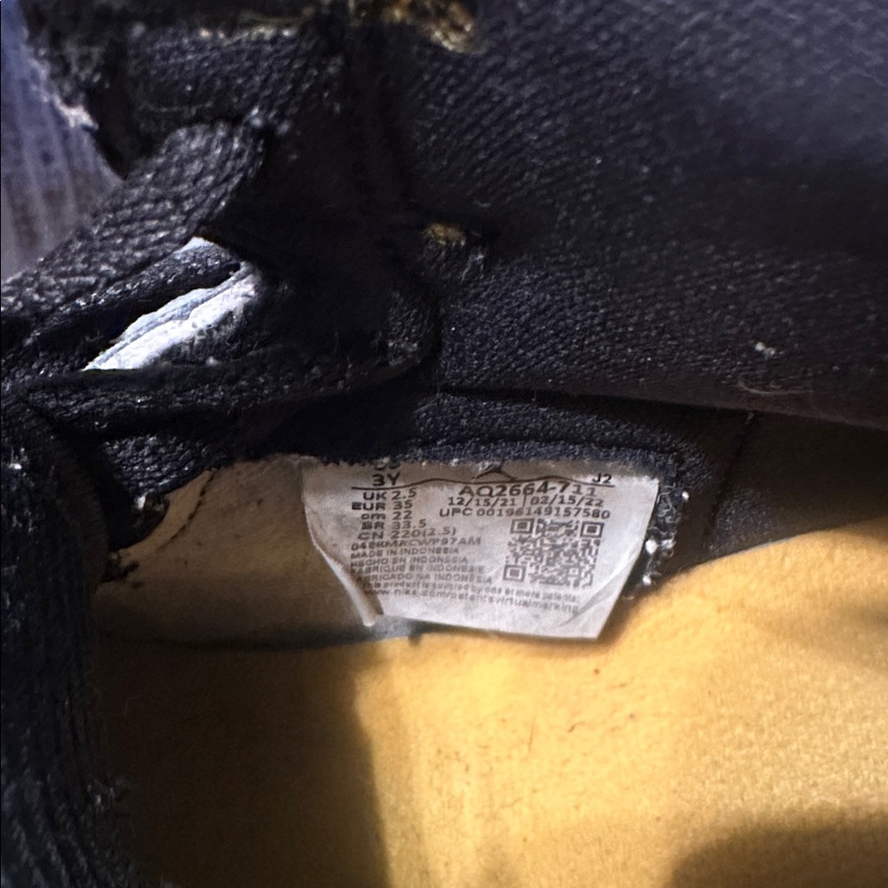 Nike Air Jordan Retro High Tops in Black, White, and Orange - Picture 11 of 11